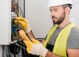 Licensed Electrician working on a job site in Hobe Sound, FL